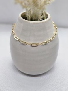 This dainty gold filled paperclip bracelet feels as luxurious as it looks! Made with the highest quality materials. If you have another length/style/color in mind let us make a custom bracelet for you! 💙 Check out our website! www.macysbraceletsllc.com  Any questions can be emailed to: Macysbraceletsllc@gmail.com Thank you for viewing our product! Delicate Chain Paperclip Bracelet As Gift, Delicate Paperclip Chain Bracelet As Gift, Delicate Paperclip Chain Bracelet Gift, Simple Everyday 14k Gold Filled Chain Bracelet, 14k Gold Filled Paperclip Link Bracelet With Delicate Chain, Gold Delicate Chain Paperclip Bracelet, Gold Paperclip Chain Bracelet As Gift, Gold Paperclip Chain Bracelet For Gift, Dainty Paperclip Bracelet With Delicate Chain