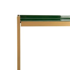 a table with a green top and gold frame on it's legs, against a white background