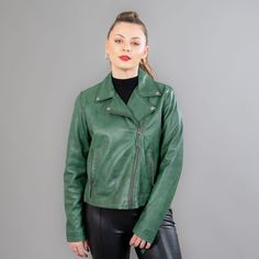 Green leather jacket with a collar. The jacket has a collar, exterior side pockets, and also a zipper closure. This garment will stand out with its unique color and warmth. The jacket manufactures in our company in Greece with high-quality lambskin. Leather: Lamb Color: Green Length: 55 - 60 cm (21,6 - 23,6 in) Collar: Yes Exterior pockets: Yes Lining: 100% Polyester Care: Specialist clean Leather Biker Jacket With Lapel Collar For Fall, Fall Leather Biker Jacket With Lapel Collar, Leather Biker Jacket With Lapel Collar For Winter, Winter Leather Biker Jacket With Asymmetrical Zip, Green Long-sleeve Biker Outerwear, Green Biker Jacket For Fall, Green Long Sleeve Biker Outerwear, Green Winter Biker Jacket With Zipper, Green Biker Leather Jacket For Fall