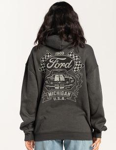 Ford Michigan Hoodie. Logo Screened On Left Chest. Large Graphic On Back. Drawstring Hood. Cuffed Long Sleeves And Hem. Fleece Lining. 50% Cotton, 50% Polyester. Machine Wash. Imported. Model Is Wearing A Size Small. Model Measurements:height: 5'8" Bust: 32"waist: 25"hips: 36" Country Hoodies, Western Hoodies, Jeep Hoodie, Michigan Hoodie, Future Aesthetic, Flare Jeans Outfit, Country Hoodie, Candle Pedestal, Cute Country Outfits