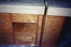 two wooden drawers are shown in this image