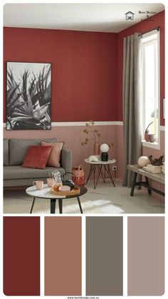 a living room with red walls and grey couches, coffee table and painting on the wall