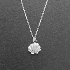 shell necklace, silver sea shell necklace, ocean love, tiny shell necklace sea shell, the piece is hand-carved using the solid silver casting technique (925 silver) measures: 1cm Includes silver chain, long 45, 50 or 60cm (if you want another measure you can contact me) Silver Casting, Shell Beach, Seashell Necklace, Jewelry Lookbook, Shell Necklaces, Summer Vibes, Silver Necklaces, Silver Chain, Sea Shells