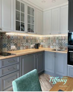 an image of a kitchen setting with tile backsplash