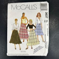 three women's skirts, one with ruffles and the other with short sleeves