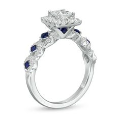 a diamond and blue sapphire engagement ring