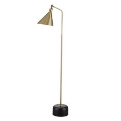 a floor lamp with a black base and a gold shade on the top, against a white background