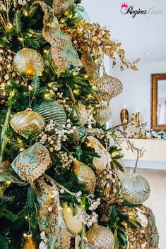 a christmas tree decorated with gold and green ornaments