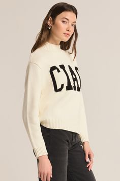 Saying goodbye (ciao) to boring sweaters? Say hello to the Ciao Intarsia Sweater. With a playful mockneck and a unique design featuring the word "ciao", this sweater is sure to add some fun and quirk to your wardrobe. Time to elevate your sweater game! Mock neckline Rib detailing Verbiage detail at front Full length sleeves Length from shoulder 23" 60% Cotton | 40% Acrylic Hand wash cold Model is 5′8″ wearing size S. Intarsia Sweater, Sparkle Shoes, Favorite Sweater, Mock Neckline, Fitted Sweater, Cozy Knits, Cotton Sweater, Hat Hairstyles, Sweater Jacket