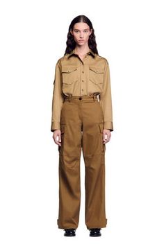 Straight-leg cargo trousers with side pockets and belt loops. Sandro Women's straight-leg trousers Cargo pockets with flaps on sides Side pockets Zip fastening with button The model is 5'8 tall and wears a size 36 Khaki Work Pants With Pockets, Khaki Work Pants With Pockets For Workwear, Khaki Straight-leg Parachute Pants For Work, Khaki Pants With Patch Pockets For Work, Khaki Cargo Pants With Patch Pockets For Work, Straight Leg Cargo Parachute Pants For Workwear, Workwear Parachute Pants With Flap Pockets, Workwear Straight Parachute Pants With Flap Pockets, Khaki Work Pants With Side Pockets