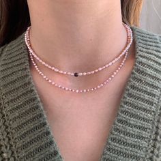 Mini Freshwater Peach Pearls, length is 15-17 inches adjustable all made with Italian Sterling Silver.   The top one is the classic Peach Pearls with one Garnet stone and the bottom one is the Peach Pearls with Pink Sapphires in-between. Adjustable Single Strand Crystal Necklace, Peach Round Necklace Gift, Peach Necklace Gift, Peach Round Necklace For Gift, Round Peach Necklace For Gift, Gift Round Peach Necklace, Adjustable Rose Gold Necklace With Round Beads, Adjustable Pink Crystal Necklaces With Natural Stones, Adjustable Pink Crystal Necklace With Natural Stones