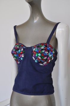 Great cotton bustier from the 80s. This comes from europe. The fabric is cotton, the beads are all present multicolor plastic beads (none missing). There is no maker or sz label, I believe its a sz m. Please see measures. The beaded cups are lined in fiber.The back is netted. The material has some stretch to it. Very good pre-owned condition, no odors or stains. Free domestic shipping get 15% discount w code crazyfashion Measures, Length 10 inch, Bust 30 inch total, cup size 5x5 inch, I believe Fitted Cotton Tops For Evening, Fitted Cotton Evening Top, Fitted Cotton Top For Evening Wear, Retro Cotton Party Tops, Fitted Multicolor Beaded Tops, Vintage Beaded Tops For Summer, Beaded Bustier, Ralph Lauren Leather, B Cup