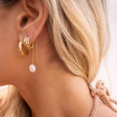 Our Maya Braided Hoops are the perfect everyday earring! What do we love about them? The textured gold hoops are dainty and the perfect size to accessorize every day. You can wear them alone for a minimalist look or stack them up with your other favorite earrings for a more edgy, eclectic style!EARRING FEATURES Gold Plated Brass Hoop (17mm) Titanium post Made for sensitive ears, nickel free Minimalist Gold Plated Threader Earrings, Minimalist Gold-plated Earrings With Delicate Chain, Trendy Gold Threader Earrings For Everyday, Minimalist Gold Plated Earrings With Delicate Chain, Delicate Gold-plated Huggie Earrings For Everyday, Everyday Delicate Chain Gold-plated Earrings, Everyday Gold-plated Earrings With Delicate Chain, Gold Plated Delicate Chain Earrings For Everyday, Everyday Gold Plated Delicate Chain Earrings