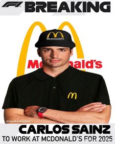 a man with his arms crossed in front of a mcdonalds advertisement