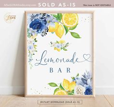 a lemonade bar sign with blue and yellow flowers