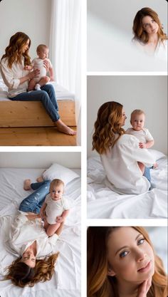 a woman holding a baby while sitting on top of a bed