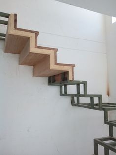 there is a set of stairs that are made out of wood