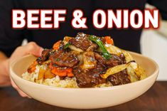 beef and onion over rice in a bowl with the words beef & onion above it