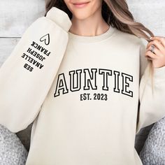 This cozy sweatshirt is perfect for any member of the Anti-Social Aunts Club! Made from a soft blend of cotton and polyester, it's comfortable and perfect for keeping you warm on chilly days. The bold, bright lettering on the front lets everyone know that you're a proud member of the Anti-Social Aunts Club. Whether you're out with your fellow aunts, running errands, or just lounging at home, this sweatshirt is sure to be a conversation starter. It's also perfect as a gift for any aunt in your life who values their alone time. Show off your pride in being an anti-social aunt with this adorable and funny sweatshirt! This sweatshirt is great for any aunt who loves her alone time, anti social, introverted, and funny gift for aunts. Please take a moment to read carrefully the information provid Long Sleeve Fall Birthday Sweatshirt, Long Sleeve Winter Birthday Sweatshirt, Birthday Long Sleeve Hoodie With Letter Print, Birthday Letter Print Long Sleeve Hoodie, Long Sleeve Hoodie With Letter Print For Birthday, Long Sleeve Sweatshirt With Lettering As Gift, Personalized Crew Neck Sweatshirt For Birthday, Birthday Long Sleeve Sweatshirt With Lettering, Casual Birthday Sweatshirt With Lettering