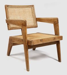 a wooden chair with woven seat and back