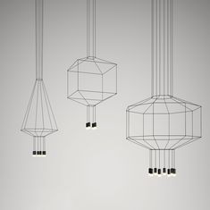 three suspended lights are hanging from the ceiling