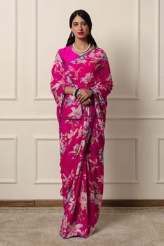 Hot pink saree featuring floral print with contrast blue piping on the hem. Comes with an unstitched blouse piece. - Aza Fashions Floral Print Georgette Pre-draped Saree, Floral Print Pre-draped Georgette Saree, Festive Silk Pre-draped Saree With Printed Motifs, Traditional Pre-draped Saree With Floral Print, Pink Pre-draped Saree With Printed Motifs For Festivals, Fitted Silk Pre-draped Saree With Printed Motifs, Fitted Pre-draped Saree With Printed Motifs In Georgette, Fitted Pre-draped Georgette Saree With Printed Motifs, Festive Pre-draped Saree With Floral Print And Traditional Drape