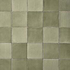 an image of a tile wall that looks like it is made out of cement