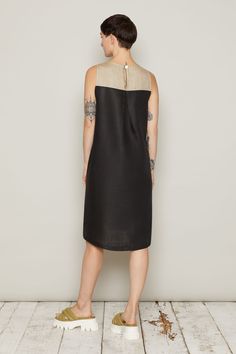 With its angular yet graceful cut, the Gauti Dress is a sleeveless, column dress that falls to the knee. The Gauti Dress has a gentle flare front, pockets, subtle slits at the side and a keyhole neck fastening. Reminiscent of Iceland’s volcanic, black sand beaches, the Gauti comes in Beige, with a contrasting slate grey back panel, or Black, with a contrasting beige back panel. Ethically made in vegan, 100% linen. Inclusive sizing, available in XS to 6XL. Each top is numbered and production is l Black Sleeveless Unlined Midi Dress, Sleeveless Linen Maxi Dress For Formal Occasions, Formal Sleeveless Linen Maxi Dress, Knee-length Dresses With Side Slits, Elegant Sleeveless Midi Dress With French Seams, Formal Sleeveless Dress With French Seams, Chic Black Sleeveless Linen Dress, Elegant Knee-length Unlined Midi Dress, Sleeveless Linen Dress With Side Slits