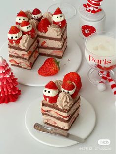 three pieces of cake with strawberries on top