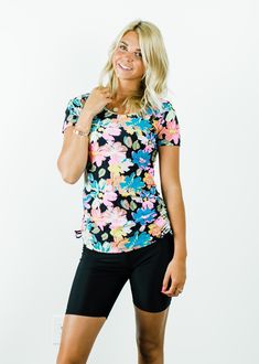 Adele Swim Top Fit & Sizing Tight fit Sleeve length 6.25” (Size S) Top length 26.2” (Size S) If you are between sizes, or in doubt, please size up For more fit and sizing info, check out our size guide Features  Short sleeve  Round neckline  Does not feature a built-in bra  Designed to be worn over our favorite swim bra  Side ruching creates a flattering cinched look Care Rinse in cold water to wash off any chemicals, chlorinated water or Swim Capris, Resort Swimwear, Comfortable Swimwear, Swim Skort, Contemporary Clothes, Swim Leggings, Swim Bra, Affordable Swimwear, Rash Guard Women