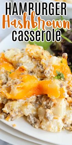 hamburger hashbrown casserole on a white plate with lettuce and carrots