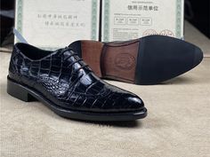 Having these shoes is the best thing to instantly add a glam quotient to your formal outfit. These men's Oxford shoes with a lace-up closure feature a crocodile skin design in the upper that adds uniqueness to your outlook. Made of crocodile skin and lined with cow skin leather, these shoes ensure comfortable walkability and durability.

Specifications




Upper Material: Crocodile Skin

Toe Shape: Pointed Toe

Shoes Type: Basic

Season: Spring/Autumn

Pattern Type: Solid

Outsole Material: Genu Party Oxford Lace-up Shoes, Party Oxford Lace-up Dress Shoes, Lace-up Oxford Dress Shoes For Party, Oxford Lace-up Dress Shoes For Party, Lace-up Leather Shoes With Crocodile Pattern, Wingtip Dress Shoes With Crocodile Pattern, Party Oxfords With Rubber Sole And Lace-up, Party Oxfords With Lace-up And Rubber Sole, Party Oxfords With Rubber Sole And Lace-up Design