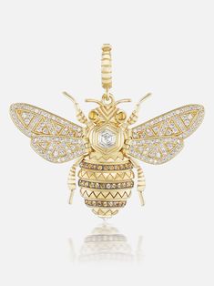 a gold and diamond bee ornament