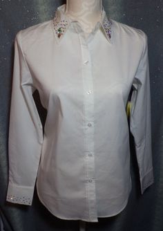 Stretch white cotton, button front shirt, large AB crystals and Swarovski Element Crystal AB on collar and cuffs  (NSBC1770)  LARGE (marked 12/14); 42 chest, 40 waist, 44 hip, 14 sides, 24 inch sleeves Please check measurements carefully before ordering. White Button Up, Crystal Ab, Button Front Shirt, Collar And Cuff, Shirt Collar, Clothing Items, White Cotton, Button Up Shirts, Button Up