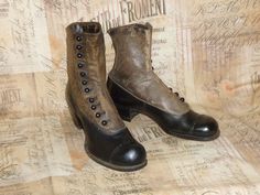 "One pair of Antique Victorian/Edwardian Button boots. The boots are made of a black leather, with a tan leather upper, glass buttons.  Bottom soles are leather, and do not show any wear-appear to be unworn.    They are in very nice vintage condition-light scuffing due to age and storage-there are 3 missing buttons on one boot.  I have not polished.   Approx Measurements- 9 1/2\" heel to toe 3\" across bottom sole at widest point, overall height 5 1/2\"-these measurements are taken on the outsid Leather Cap Toe Boots With Buttons, Classic Leather Boots With Buttons, Classic Boots With Buttons And Round Toe, Vintage Leather Boots With Buttons, Victorian Leather Boots For Formal Occasions, Victorian Black Boots With Round Toe, Black Victorian Boots With Round Toe, Victorian Black Boots For Formal Occasions, Black Victorian Boots For Formal Occasions