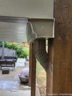 an open mailbox on the side of a house