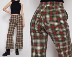 "Vintage early 70s red & green plaid knit pants with a high waist, a cuffed flared leg, and a zipper and snap at the waist for closure. Perfect for the holiday season!  Measurements and Condition: Fits like: Women's small to medium (they have been altered at the waist but it is possible to redo it) Fabric: Feels like acrylic Brand: None Condition: Very good, with light general wear, some light pilling to the back inner thighs, and they were taken in at the waist by a previous owner (see close up Knit Trousers, Boho Fall, Cuffed Pants, Winter Clothes, Knit Pants, Green Plaid, Vintage Denim, Trousers Women, Red Green