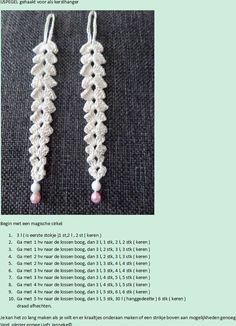 two white crocheted earrings with pink beads