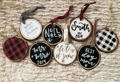 six decorated christmas ornament hanging on a blanket