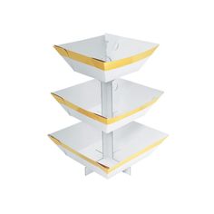 three white and yellow boxes stacked on top of each other