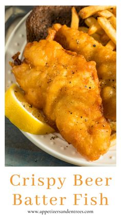 crispy beer battered fish served with fries and lemon wedges