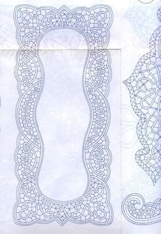 two blue papers with intricate designs on them