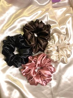 Soft, luxurious, jumbo scrunchies availiable in 4 colors 💖🖤🤍🤎 | #scrunchies #luxuryaccessories #hairstyles #accessories #aesthetic #cute Cute Scrunchies, Under Bust Corset, Arm Accessories, Handmade Scrunchie, Satin Corset, Velvet Scrunchie, Functional Fashion, Ponytail Holders, Polyester Satin