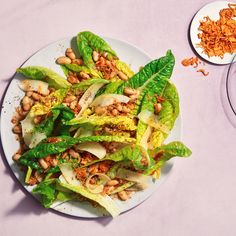 lettuce and beans salad on a white plate