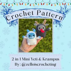 a hand holding two small crocheted animals in front of a snowflake background