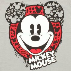 a mickey mouse t - shirt with the words mickey mouse on it