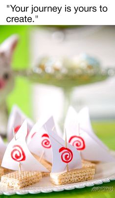 small sailboats on crackers with caption that reads, your journey is yours to create