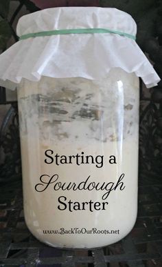 a jar filled with liquid sitting on top of a table