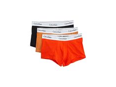 Calvin Klein Underwear Modern Cotton Stretch Low Rise Trunks 3-Pack - Men's Underwear : Acid Orange/Honey Brown/Black : Experience ultimate comfort in the extra soft cotton blend Calvin Klein Underwear Modern Cotton Stretch Low Rise Trunks 3-Pack. Flexible fit. Pack of three cotton stretch trunks. Low-rise design. Pull-on style. Trunk silhouette. Elasticized waistband with branding detail. Supportive contoured pouch. 88% polyester, 12% elastane. Machine wash, tumble dry. Imported. Measurements: Fitted Cotton Boxer Briefs With Logo Waistband, Fitted Boxer Briefs With Logo Waistband, Mens Calvin Klein, Orange Honey, Black Experience, Honey Brown, Low Rise, Calvin Klein, Cotton Blend