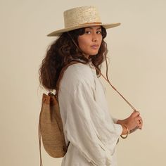 Ideal for any adventure and perfect for days spent on a plane or the beach, The Transito Backpack is a catch-all that’s up for everything you are. It has adjustable leather straps and a cinching leather top to secure your goods but still allow you convenient access. Handmade by skilled artisans and woven from an all-natural, plant-dyed cactus fiber and high-quality, vegetable-tanned leather. Style Notes Adjustable, removable straps Size: H 12" x L 9.5" x W 9" Large enough to hold all the essenti Summer Daily Use Shoulder Backpack, Everyday Bags With Adjustable Leather Trim, Adjustable Bags With Leather Trim For Everyday Use, Everyday Use Bags With Leather Trim And Adjustable Fit, Brown Travel Backpack With Adjustable Straps, Summer Standard Backpack With Adjustable Strap, Standard Backpack For Everyday Summer Use, Everyday Summer Standard Backpack, Summer Travel Shoulder Bag With Adjustable Strap